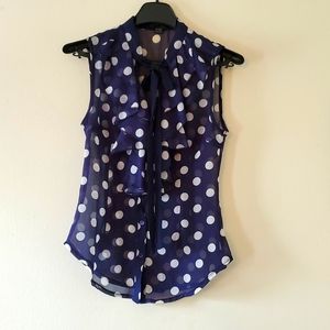 Navy ruffle front polka dot blouse